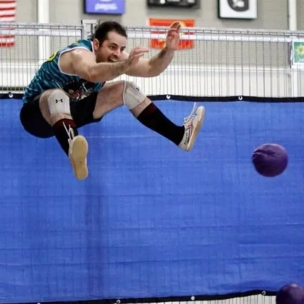 Steven Conway, mid-air dodgeball action shot